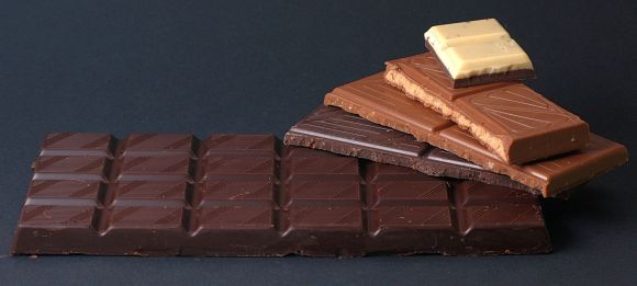 Chocolate on a dark background: Five types of noble bitters up to latte macchiato. Chocolate on a dark background: Five types of noble bitters up to latte macchiato.
