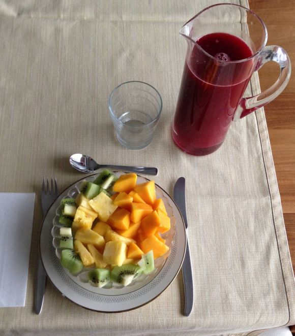 Snack for several people: mango, pineapple, kiwi and freshly squeezed blood orange juice. Snack for several people: mango, pineapple, kiwi and freshly squeezed blood orange juice.