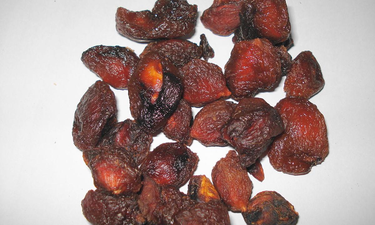 Dried, unsulphured plums, which are usually darker in color. Dried, unsulphured plums, which are usually darker in color.