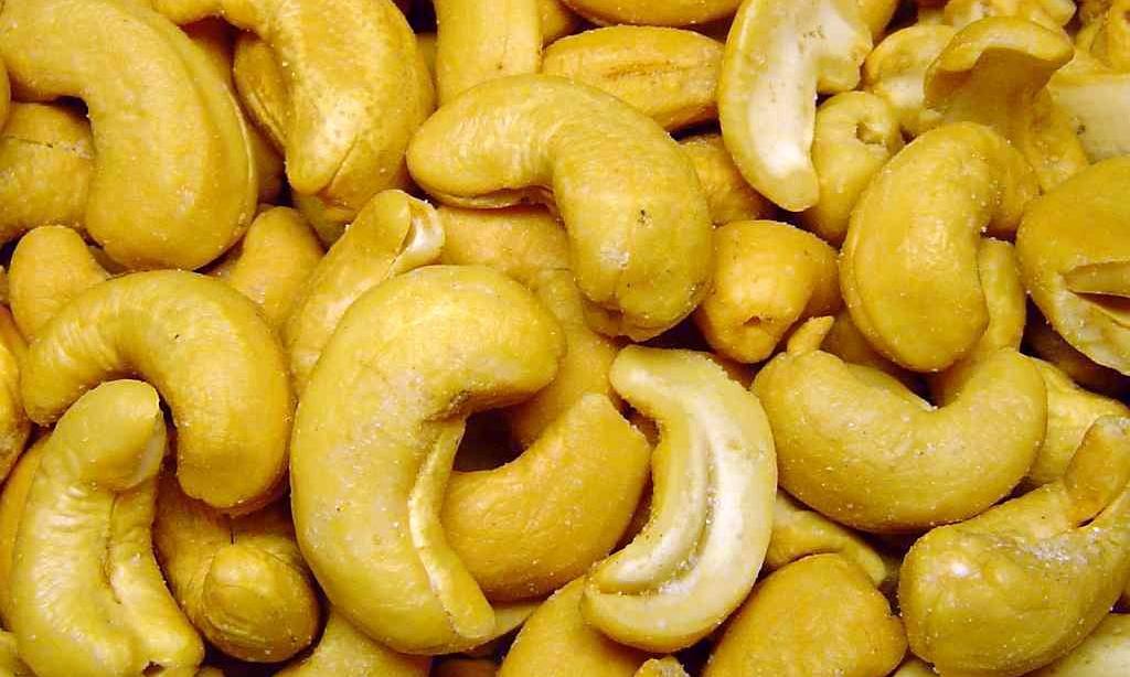 Cashew kernels of the cashew tree (Anacardium occidentale), piled up as merchandise. Cashew kernels of the cashew tree (Anacardium occidentale), piled up as merchandise.
