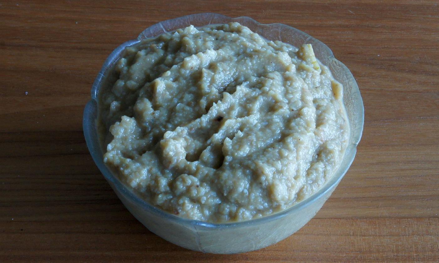 The finished eggplant hummus (baba ganoush) in a small glass bowl