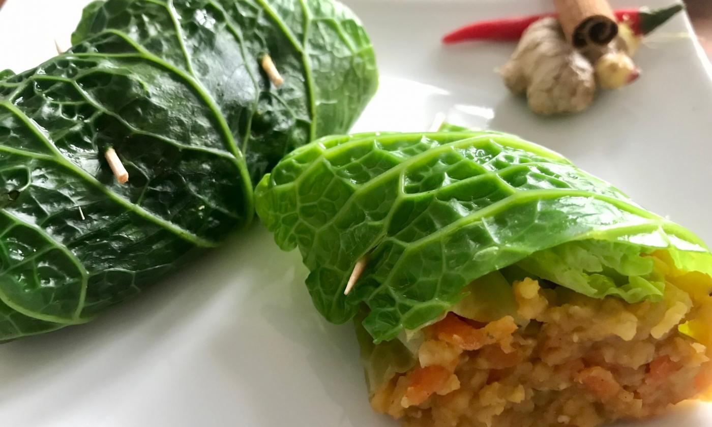 Close-up of the finished "Savoy cabbage rolls with red lentils, carrots and ginger".