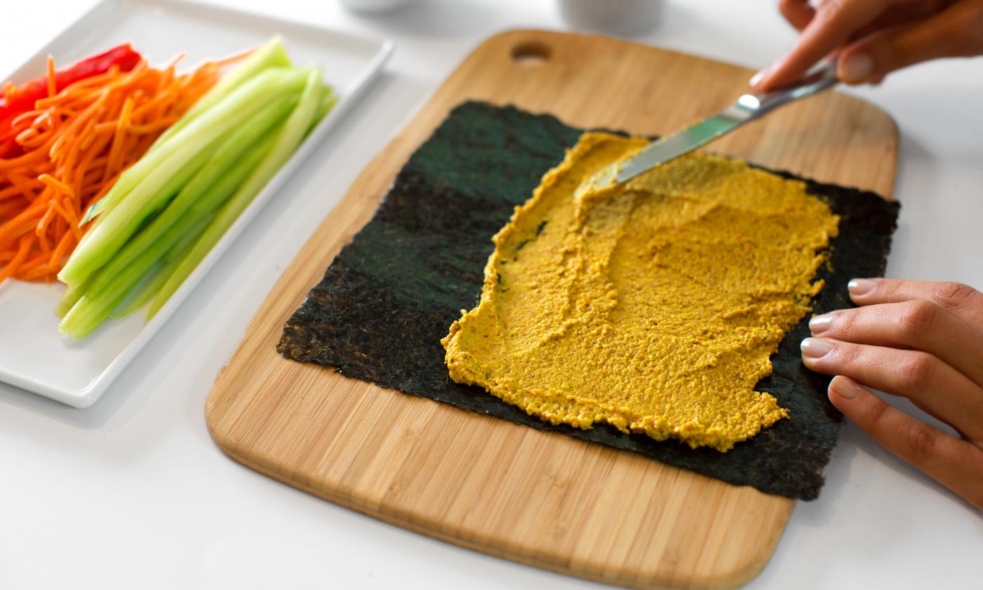 Preparation: step 1 of 3 for Nori Rolls with Ginger Almond Paste and Raw Vegetables from the cookbook “Choosing Raw”, p. 229