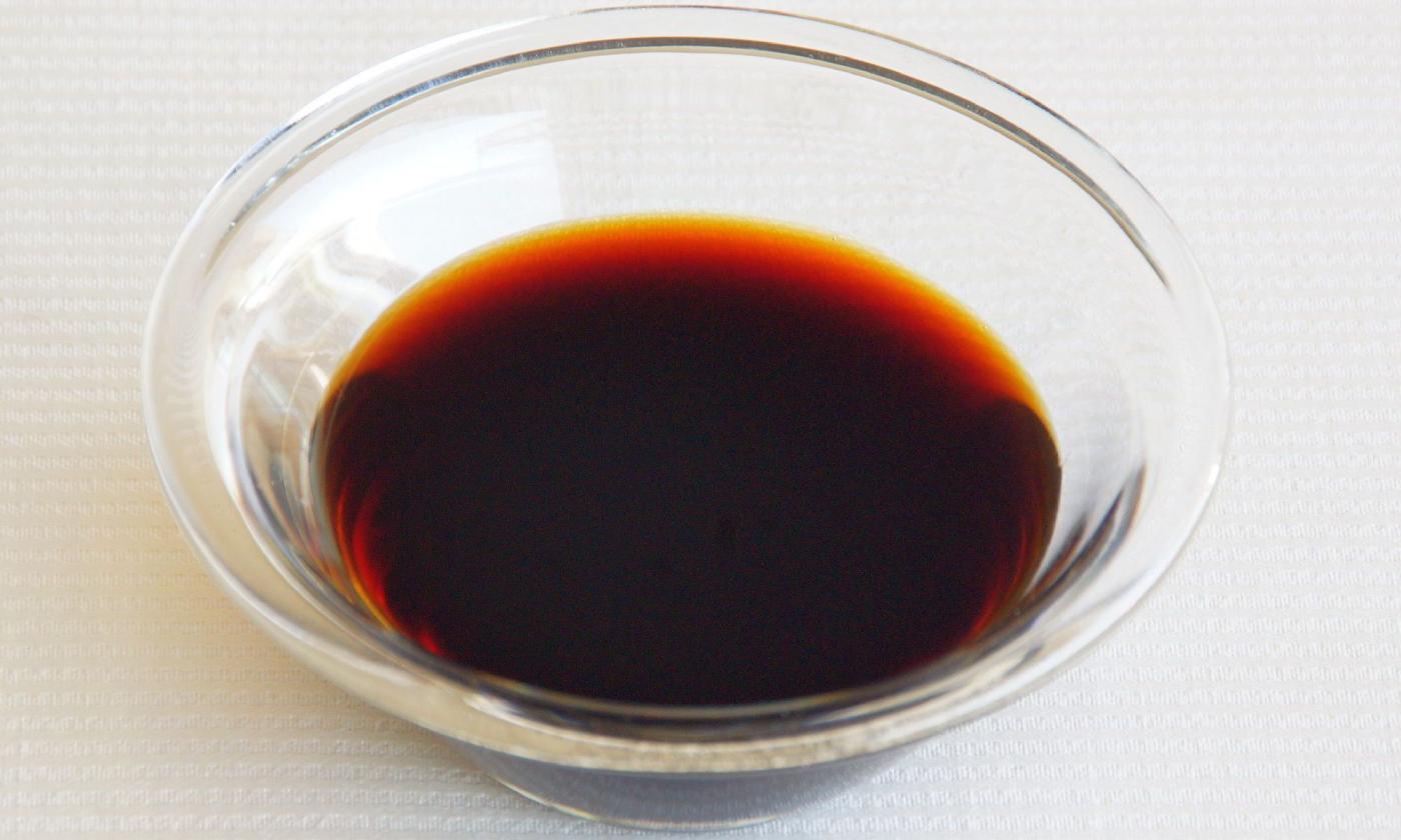 Soy sauce in glass bowl: Soy sauce is mainly used as an ingredient in Asian dishes. Soy sauce in glass bowl: Soy sauce is mainly used as an ingredient in Asian dishes.