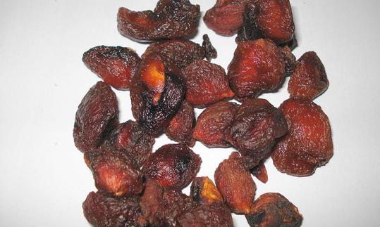 Dried, unsulphured plums, which are usually darker in color. Dried, unsulphured plums, which are usually darker in color.