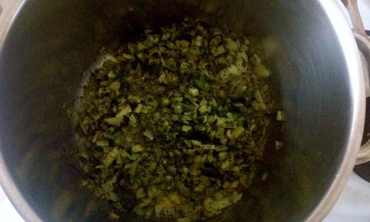 Almost all the ingredients of the potato and bean stew with dill are in the pot