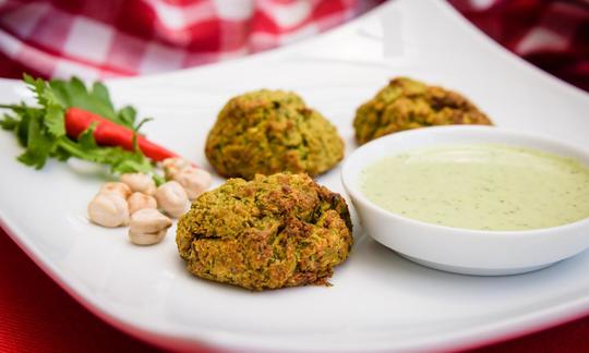 Ready-made “Baked green falafel according to Terry Hope Romero”, served on a plate. Ready-made “Baked green falafel according to Terry Hope Romero”, served on a plate.