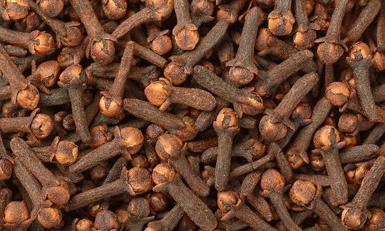 Dried cloves (Syzygium aromaticum) not yet ground. Dried cloves (Syzygium aromaticum) not yet ground.