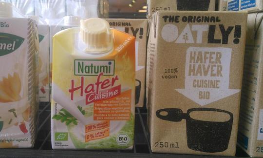 Vegan oat cream or oat cuisine, ready to buy in an organic store. Vegan oat cream or oat cuisine, ready to buy in an organic store.