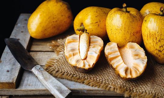 Soursop - Annona reticulata - one of them cut in half. There are different varieties/colors. Soursop - Annona reticulata - one of them cut in half. There are different varieties/colors.