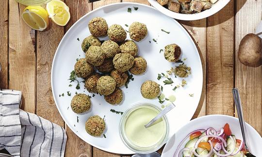 Prepared "Baked Green Falafel"  by Terry Hope Romero, arranged on a plate. Prepared "Baked Green Falafel"  by Terry Hope Romero, arranged on a plate.