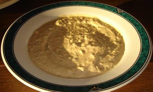 Plate filled with Tahina, a paste also known as Tahini or Tahin from ground sesame seeds. Plate filled with Tahina, a paste also known as Tahini or Tahin from ground sesame seeds.