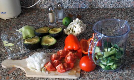 Roughly chopped ingredients for the "Cold Avocado-Cucumber Soup with Kohlrabi", some of which have already been put into the measuring cup for the mixing proces