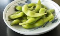 Edamame, ready-made Japanese-style soybeans as an appetizer, still unpeeled.