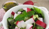 Top left: bowl with hemp oil — for the spring salad in the large bowl on the right.