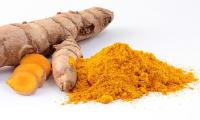 Turmeric (Curcuma longa L.): tumeric root (left), coursely ground powder (right).