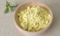 Lupine flour (Lupinus albus) in a wooden bowl. The sweet lupine L. angustifolius is also used.