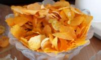 Sweet potato chips in a bowl, ready to eat.