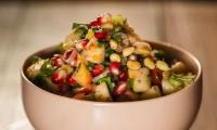 Recipe image: Pomegranate and Apple Tabouleh from the cookbook “Vegan Oriental,” p. 131.