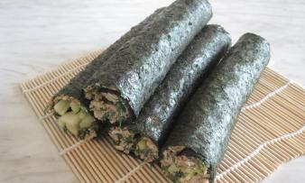 Raw sushi with celery filling ready to enjoy - any other fillings are possible. Raw sushi with celery filling ready to enjoy - any other fillings are possible.